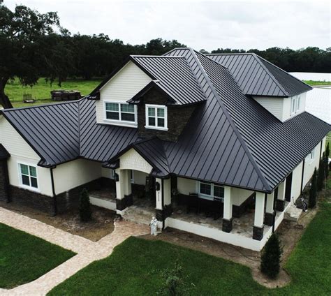 black house with black metal roof|2 foot black metal roofing.